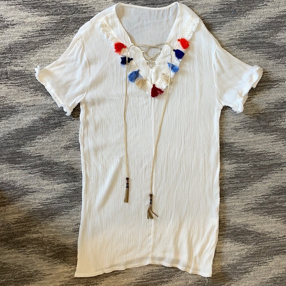 White beach coverup with colorful tassels
